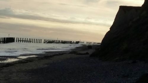 Scenic view of sea at sunset