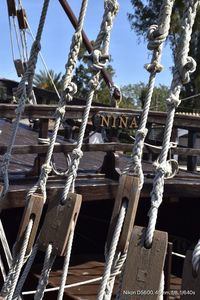 Low angle view of ropes against sky