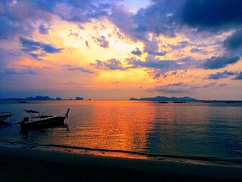 Scenic view of sea against dramatic sky