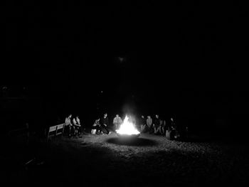 People enjoying illuminated at night