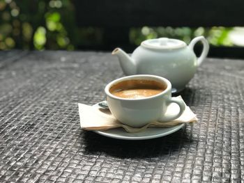 Coffee cup on table