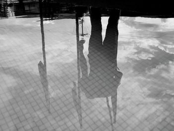 Low section of people standing in water