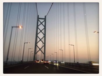 Suspension bridge against sky