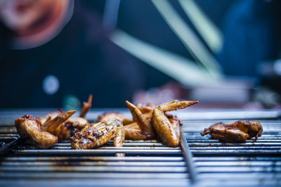 Close-up of meat on barbecue grill