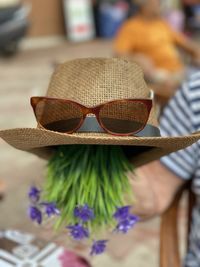 Close-up of woman wearing hat