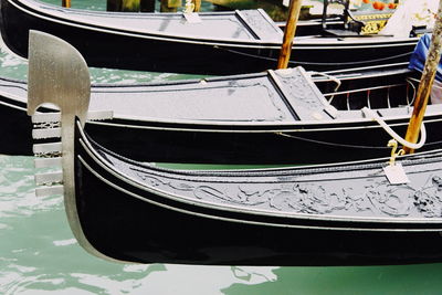 Close-up of boat moored at shore