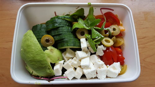 High angle view of vegetables in plate on table