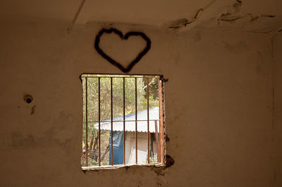 Low angle view of window in old building