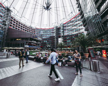 People walking on street in city