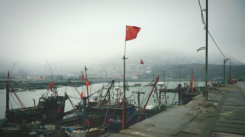 Chinese flag on pole at harbor