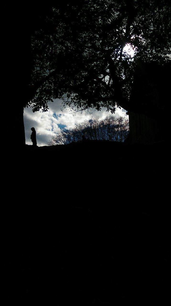 silhouette, dark, sky, outline, tranquility, nature, unrecognizable person, cloud - sky, lifestyles, outdoors, beauty in nature, tranquil scene, cloud, scenics, landscape