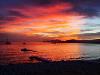 Silhouette of boat at sunset