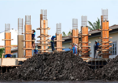 Stack of construction site against sky