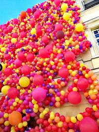 Low angle view of colorful balloons