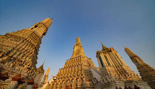 Low angle view of temple against building