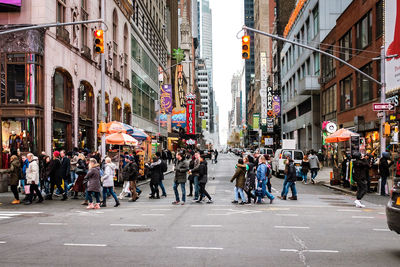 People walking on city street