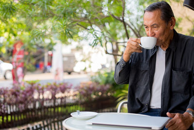 Man drinking coffee