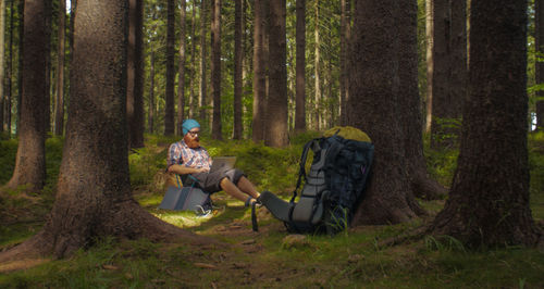 Man camping in forest