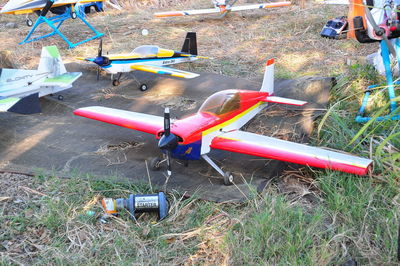 High angle view of abandoned airplane on field