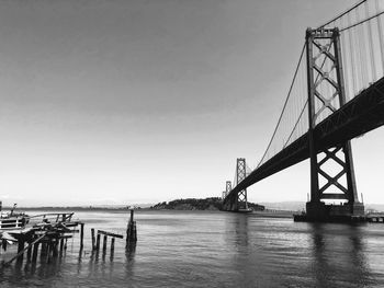 View of suspension bridge over sea