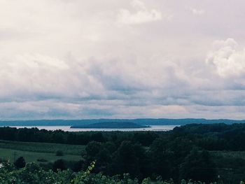 Scenic view of sea against cloudy sky