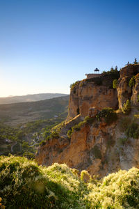 Scenic view of mountain against clear blue sky