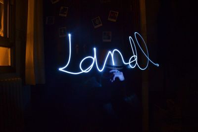 Illuminated text on night