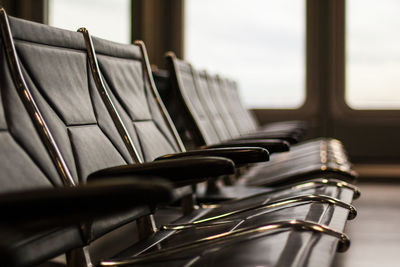 Close-up of empty seats on table