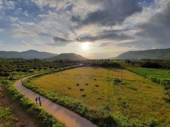 Scenic view of landscape against sky during sunset