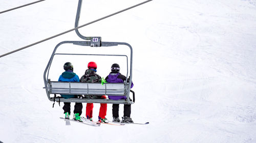 People sitting in ski lift