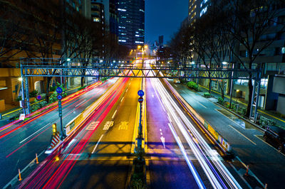 Light trails on city street at night