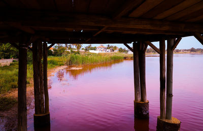 Reflection of pier in lake