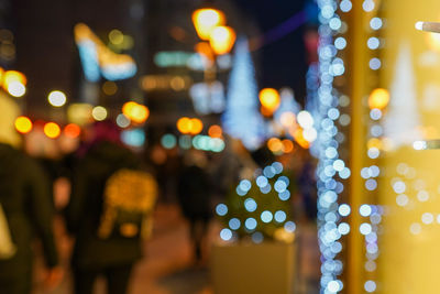 Christmas lights, christmas decorations on the street. blurred background city 