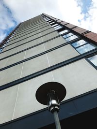 Low angle view of office building against sky