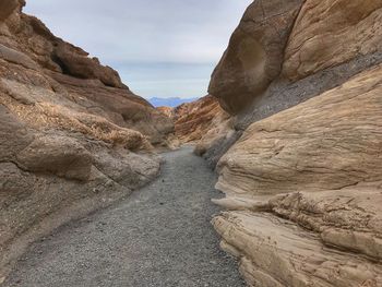 Rock formation on land against sky