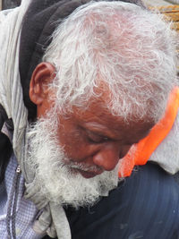 Close-up portrait of man wearing hat