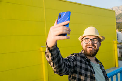 Young man using mobile phone