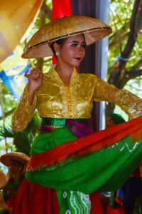 Full length of woman wearing hat