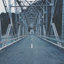 Metallic bridge over river