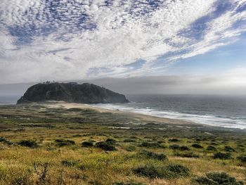 Scenic view of beach against sky