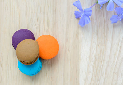 Close-up of blue flowers on wooden table