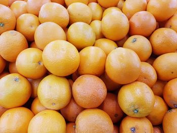 Full frame shot of oranges in market