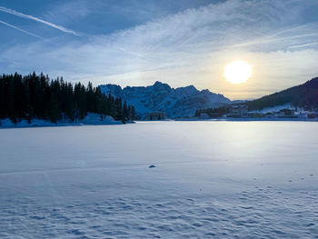 Scenic view of snowcapped mountains against sky during winter