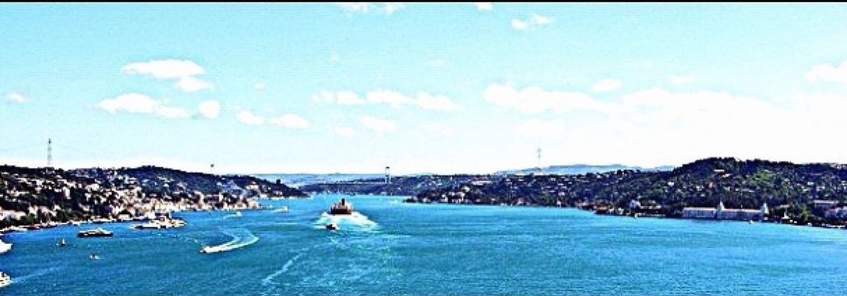 water, sea, nautical vessel, transportation, sky, blue, mode of transport, tranquil scene, scenics, tranquility, boat, mountain, beauty in nature, nature, waterfront, sailboat, cloud - sky, sailing, day, cloud