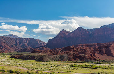 View of mountain range against cloudy sky