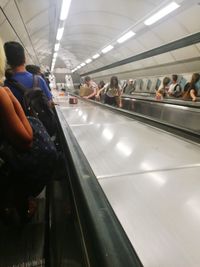 People on escalator