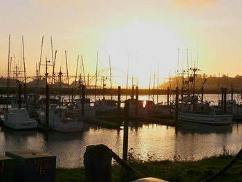 Boats moored at harbor