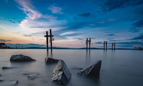 Scenic view of sea against sky during sunset