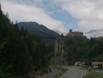 View of road against cloudy sky