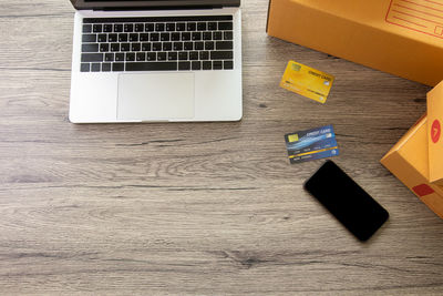 High angle view of mobile phone on table